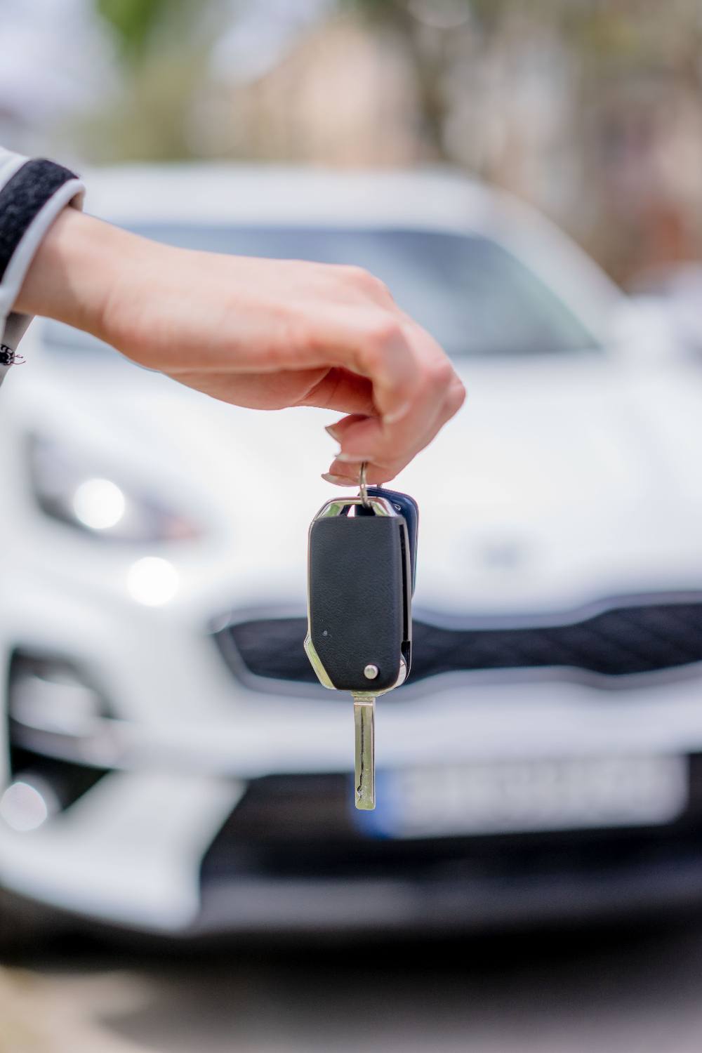 Car keys being handed over